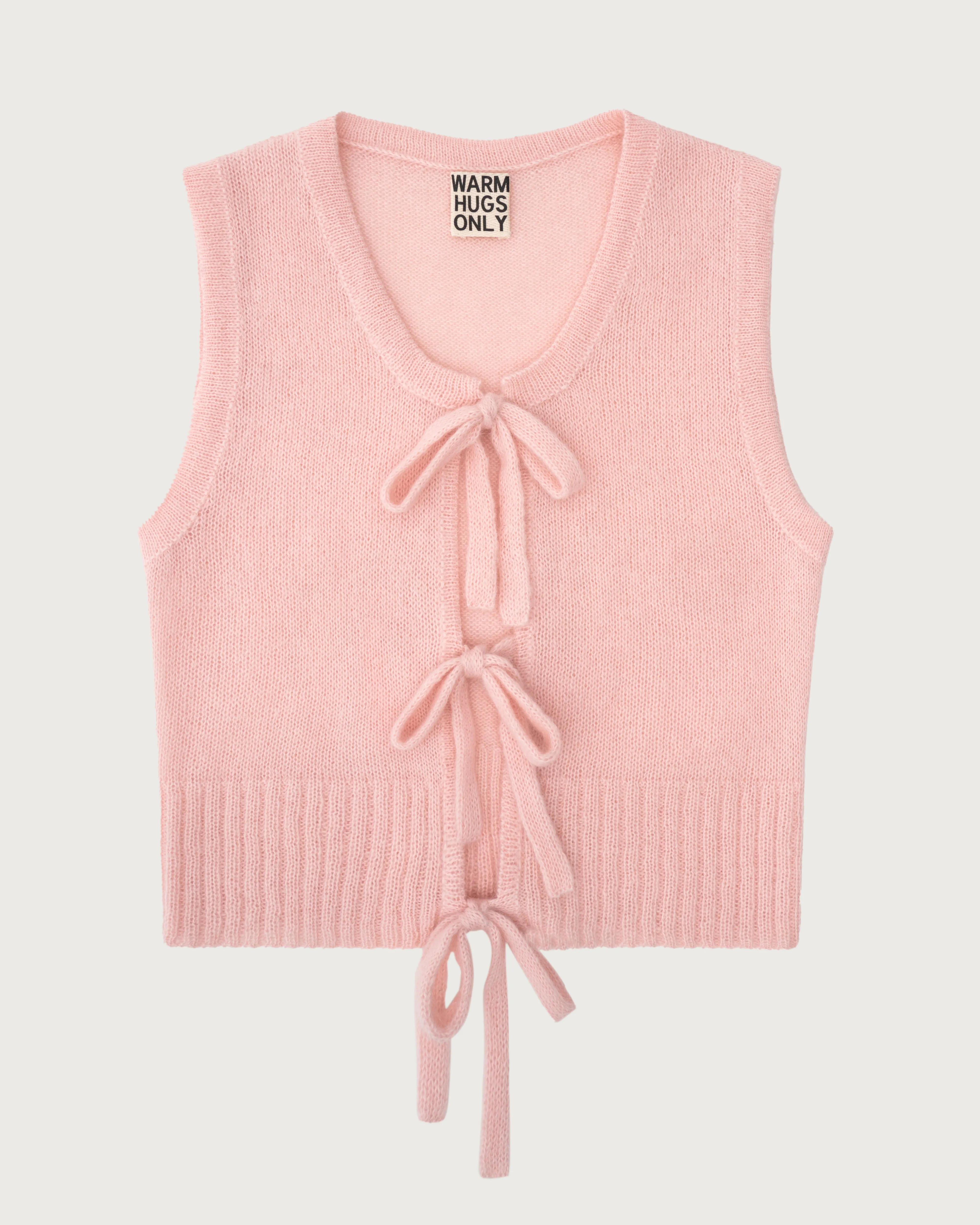 Pink bow vest